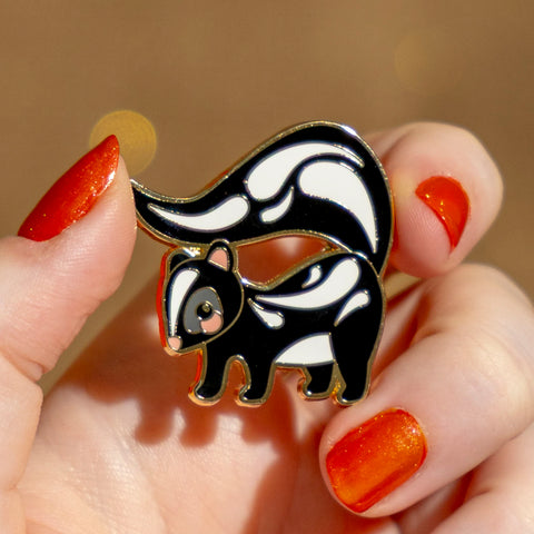 The Sassy Skunk Enamel Pin